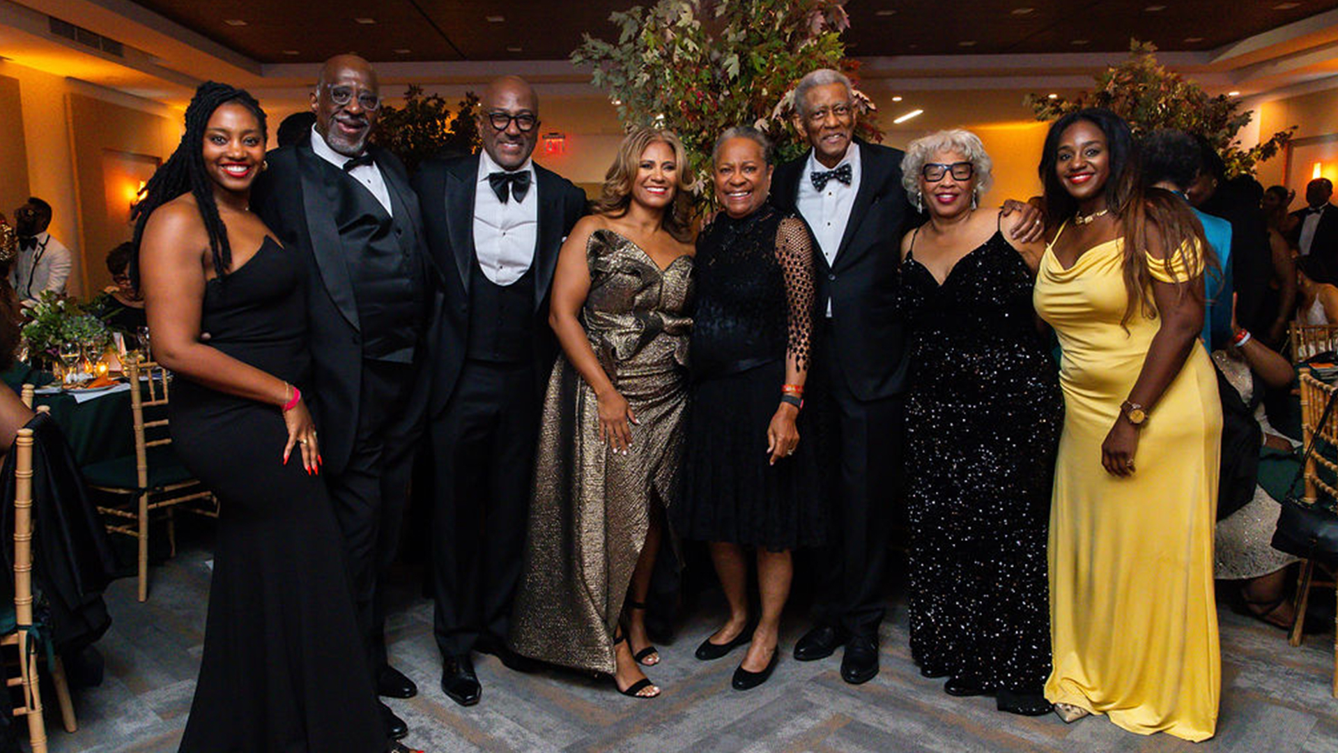 Pastor with group at gala